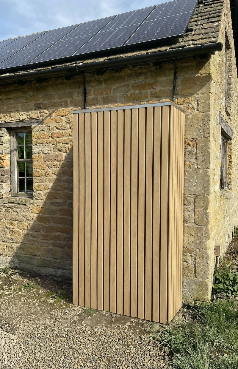 Solar battery cover in Oak finish — installed and fitted — SolarBatteryCovers.ie